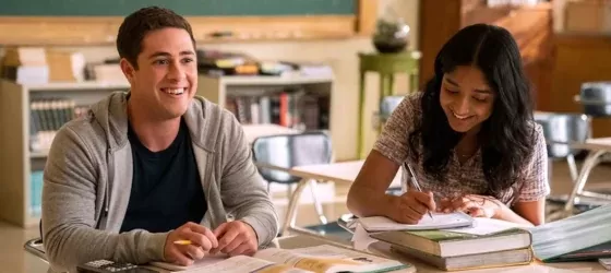 Ben and Devi Vishwakumar studying in class in Never Have I Ever season 4.