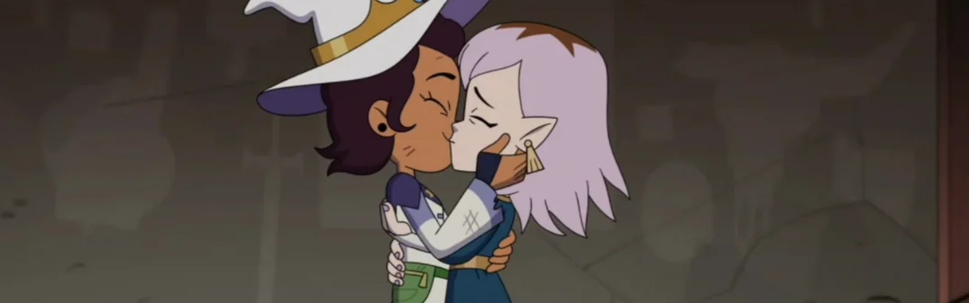 Luz kissing Amity in The Owl House series finale.